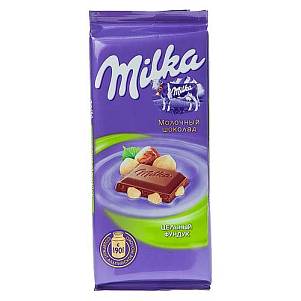 Шоколад Милка молочный с цельным фундуком 85гр-100гр
